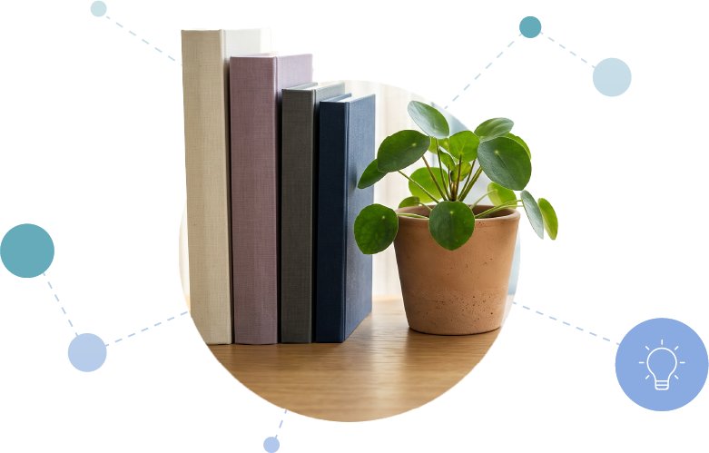 Books and plant on desk with connecting lines and dots and handshake icon