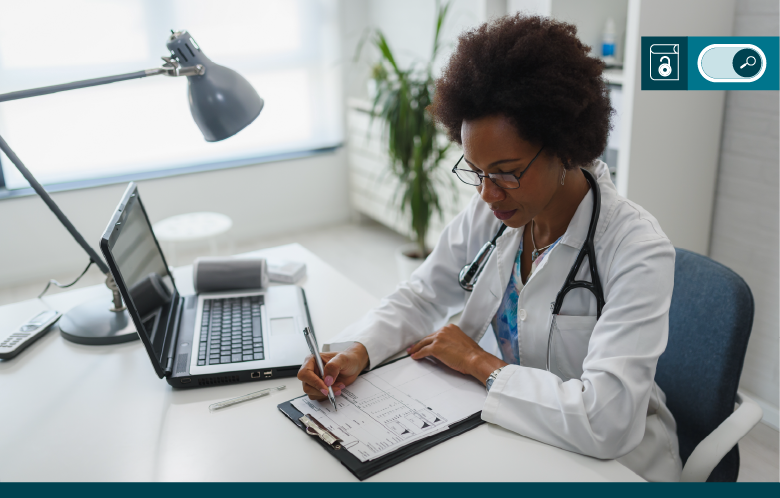 image of a doctor working on her laptop
