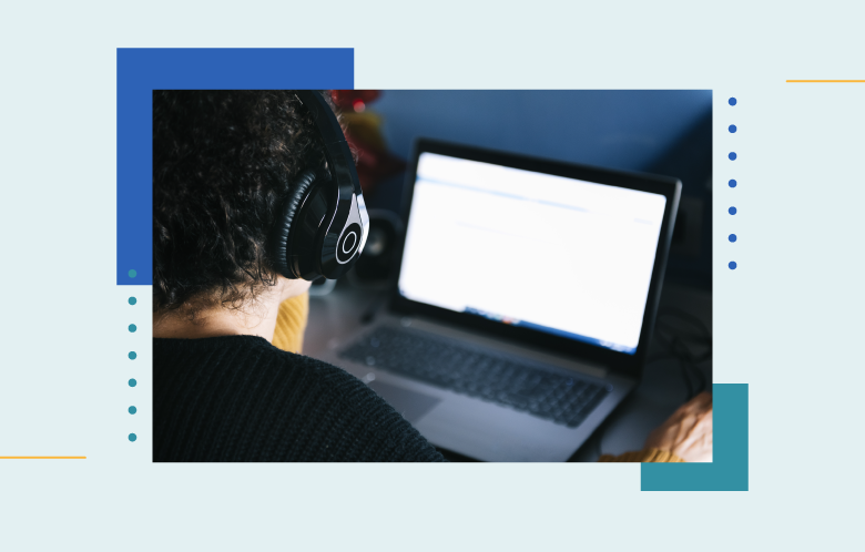 researcher looking at a laptop with headphones on with square and dot pattern