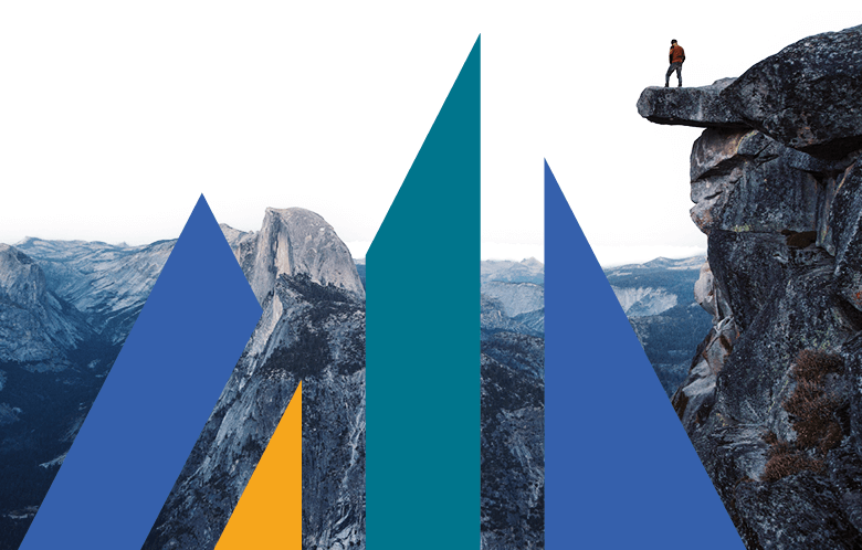 hiker overlooking the mountains