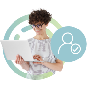 student with glasses holding a laptop with an icon of a user and check mark 