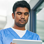 Close up of nurse on tablet