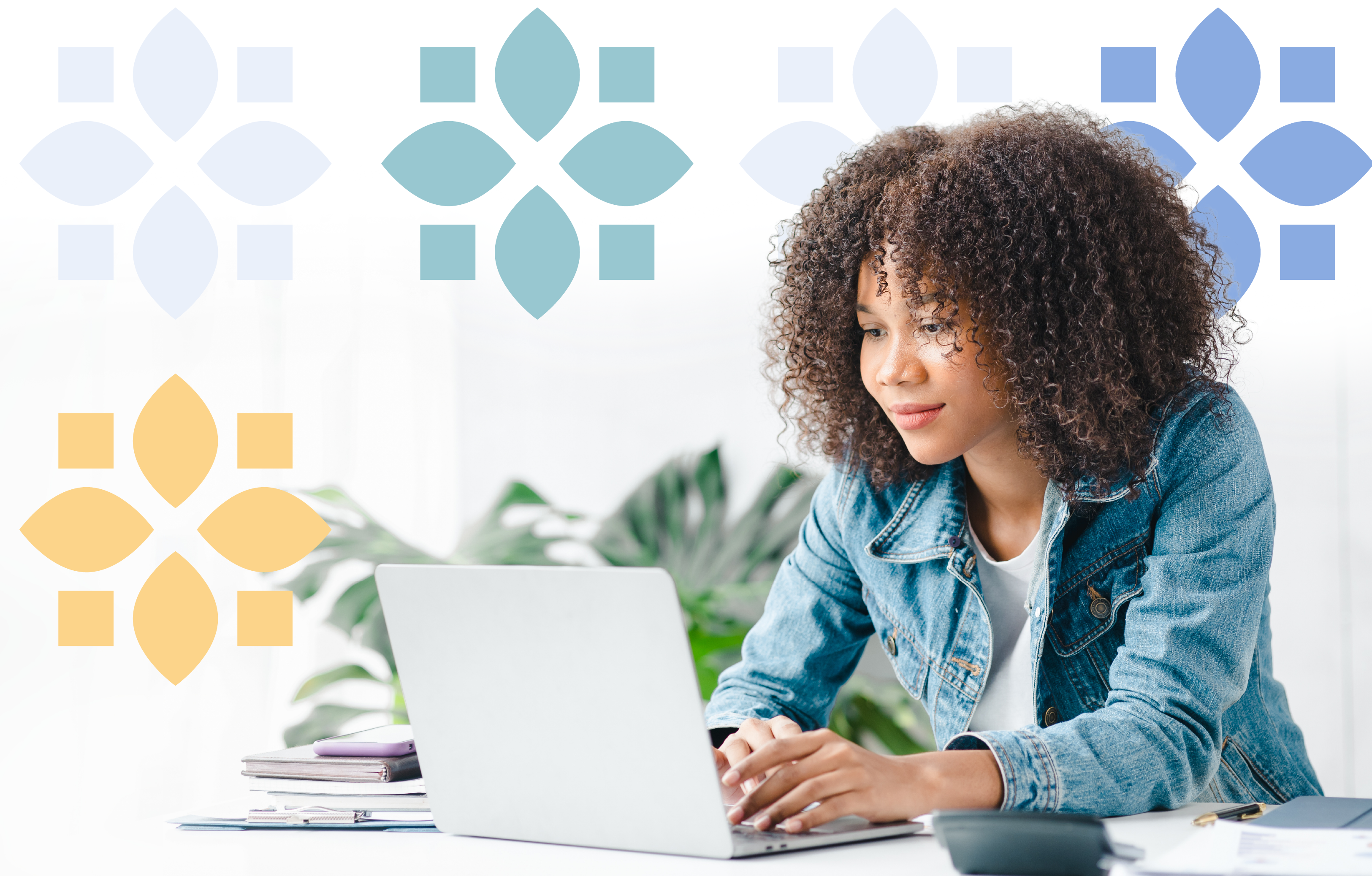 Student working on a laptop at a desk, surrounded by colorful geometric patterns.