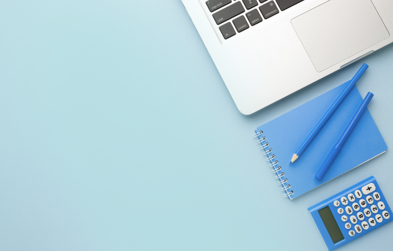 image of laptop, notebook, and calculator