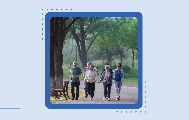 image showing older people walking in a park in a group