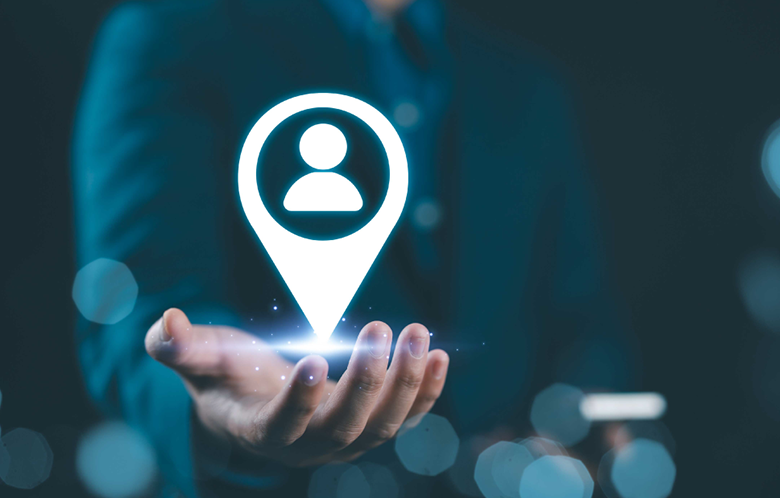 image of a hand holding location/user icon