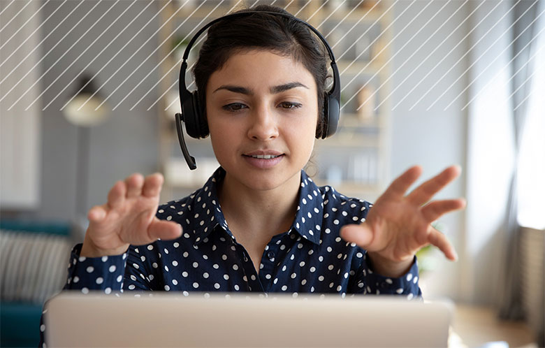 Woman with a headset speaking during a webinar