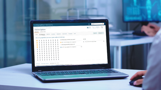 DynaMed Decisions screenshot on laptop in clinical setting