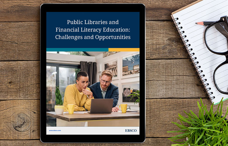 financial literacy white paper displayed on a tablet