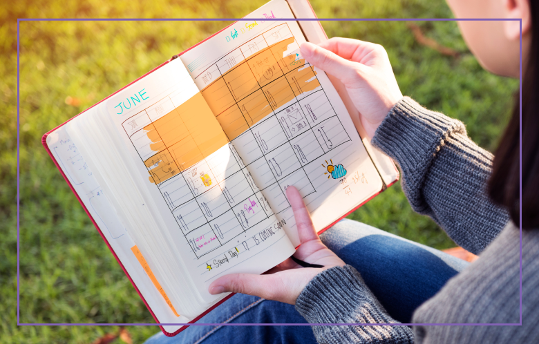 girl holding a planner