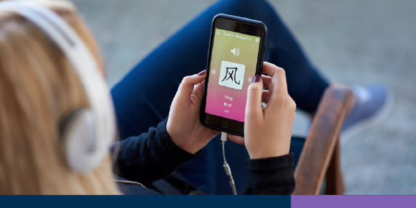 Image of a woman learning a language