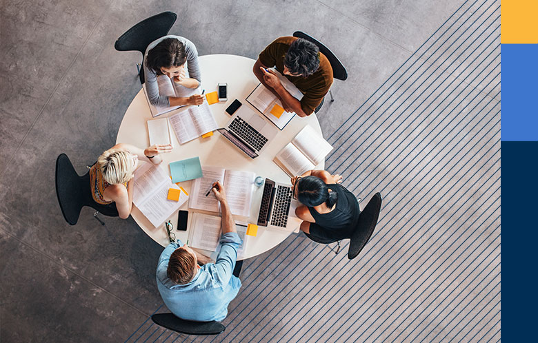 Overhead shot of a group of students working a table