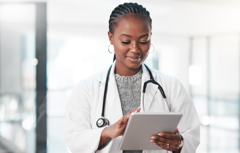 medical resident learning on a tablet device