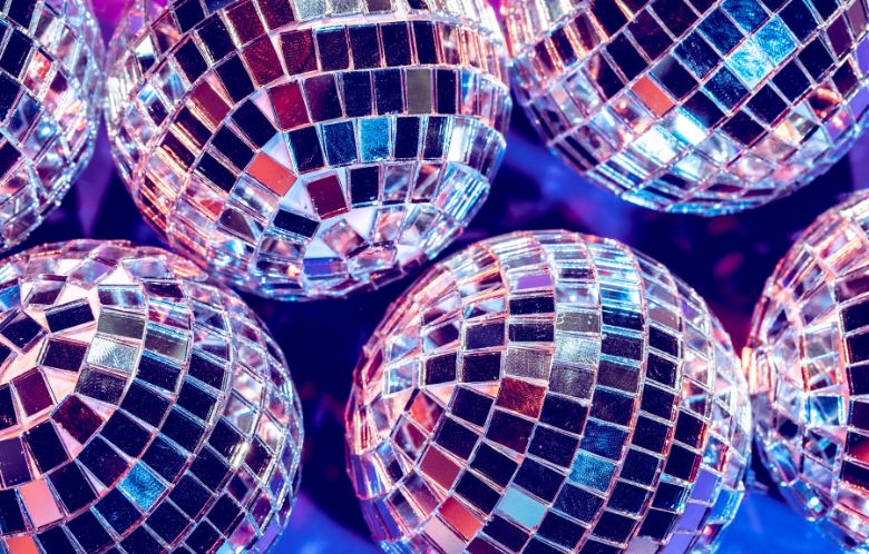 a close up of several disco balls