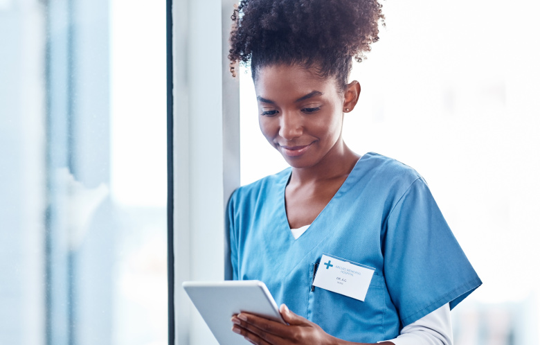 doctor on a tablet with DynaMedex logo