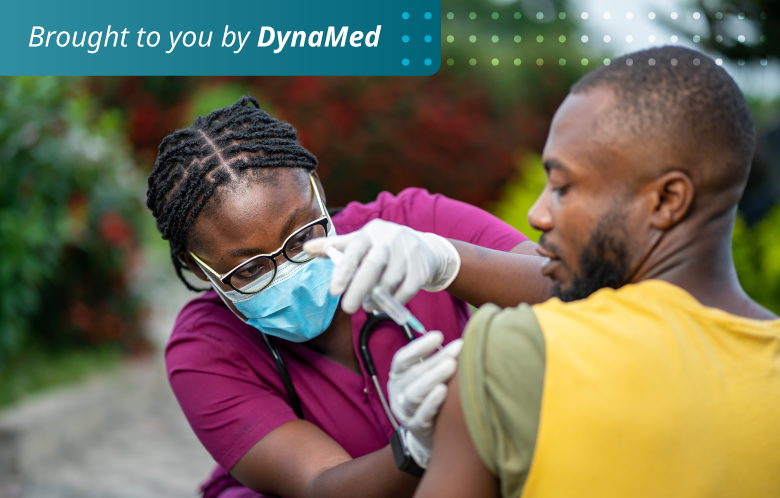 Nurse giving a patient a vaccine outside