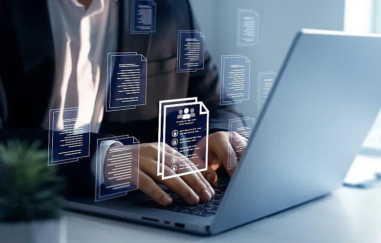 image of a researcher working on laptop with metadata icons overlayed